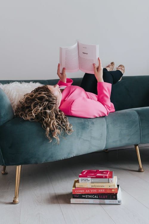 SkyeBlu Cutchie reading, reflecting her thoughtful, client-centered approach to therapy